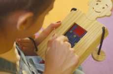 Phone-Powered Wooden Toys