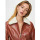 Vintage-Inspired Cropped Vinyl Jackets Image 2