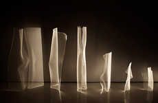 Fluid Illumination-Inspired Lamps