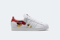 Celebratory Cartoon-Adorned Sneakers Image 3