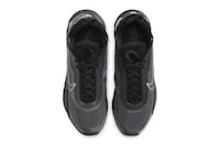 Subtle All-Black Sneakers Image 3