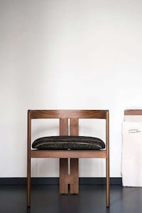 Symmetrical Wooden Chairs Image 1