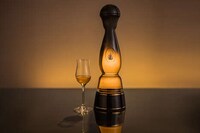 Gold-Adorned Tequila Bottles Image 1