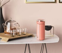 Tea Tradition-Inspired Drink Carriers
