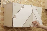 Kinetic Scissor-Style Storage Cabinets Image 1