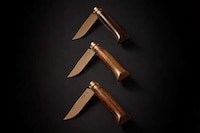 Semi-Fossilized Wood Hand Knives Image 1
