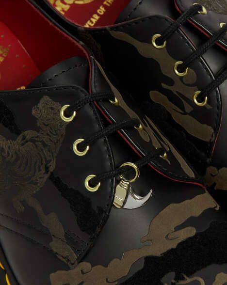 Elevated Tiger-Inspired Boots