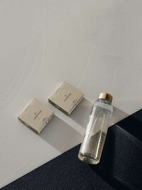 Model-Backed Chrome Bottles Image 4