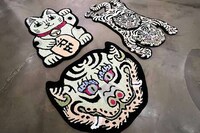 Intricate Mascot-Honoring Rugs
