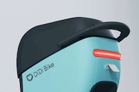Crowded Cityscape Electric Bicycles Image 7