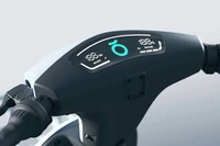 Crowded Cityscape Electric Bicycles Image 8