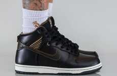 Gold-Accented Winged Sneakers