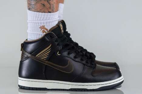Gold-Accented Winged Sneakers