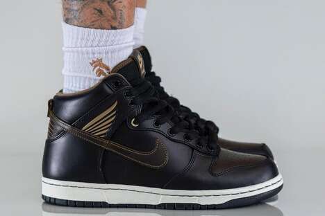 Gold-Accented Winged Sneakers