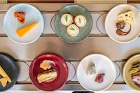 Cheese-Focused Conveyor Belt Restaurants Image 2