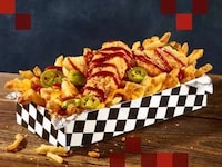 Topping-Heavy Seasoned Fries Image 1