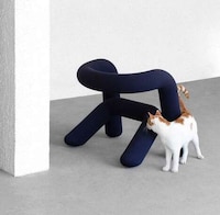Structural Layered Bold Armchairs Image 1