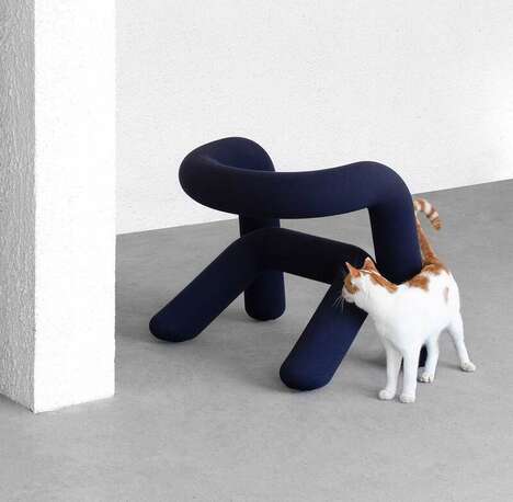 Structural Layered Bold Armchairs
