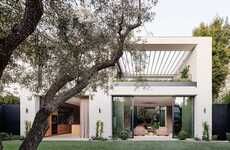 Olive Tree-Centric Wooden Homes