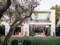Olive Tree-Centric Wooden Homes Image 1