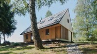 Lake-Bordering Timber Cabins Image 3
