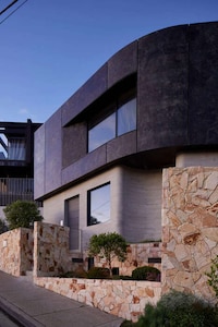 Stone-Finished Coastal Homes Image 1