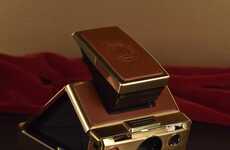 Solid Gold Instant Cameras