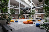 Cozy Mixed-Use Gathering Spaces