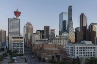 Feminine Silhouette Tall Buildings Image 1