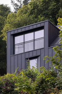 Metal-Clad Sleek Hillside Houses Image 1