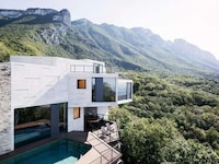 Forested Hillside Family Homes Image 1