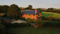 Sustainable Red Utilitarian Homes Image 2