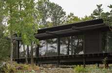 Tar-Coated Timber Homes