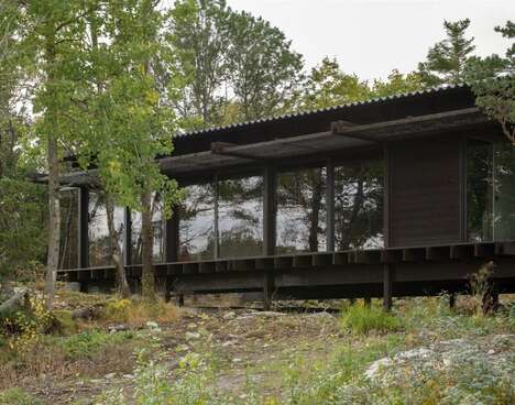 Tar-Coated Timber Homes