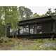 Tar-Coated Timber Homes Image 1