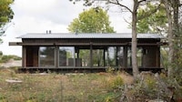 Tar-Coated Timber Homes Image 3