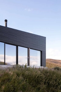 Timber-Clad Dark Tonal Homes