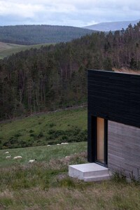 Timber-Clad Dark Tonal Homes Image 2