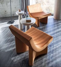 Curvaceous Padded Lounge Chairs Image 1
