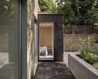 Dark Brick Apartment Extensions