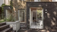 Dark Brick Apartment Extensions Image 2