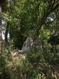 Boulder-Resembling Cabin Designs