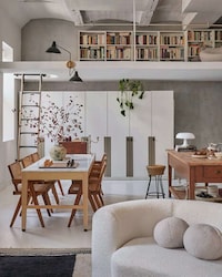 Book-Filled Mezzanine Lofts Image 1