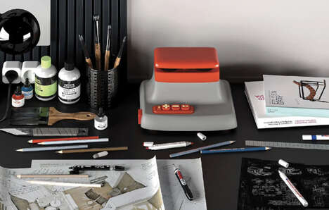 Orange-Accented Concrete Speakers