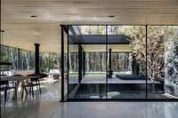 Apple Tree-Surrounding Glass Homes Image 1