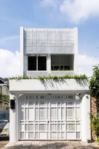 Illuminated Narrow Vietnamese Homes Image 1