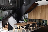 Vertically Ruptured Juxtaposing Homes Image 1