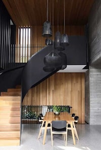 Vertically Ruptured Juxtaposing Homes Image 2