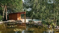Garden-Surrounded Pool House Image 2