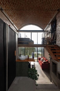 Vaulted Brick Illuminating Homes